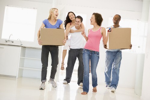 Household boxes and furniture being prepared for a Brent move