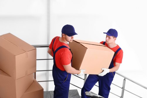 Workplace furniture being prepared for an office move in Brent