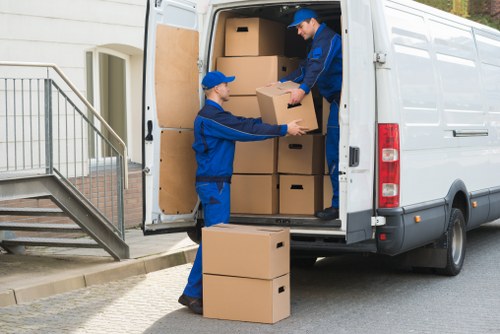 Sorted cardboard, metal, and household items ready for recycling