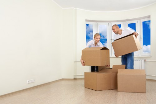 Settling into a new home after Brent removals with unpacked boxes