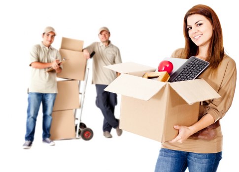 Loading furniture into a removal truck for a flat move in Brent